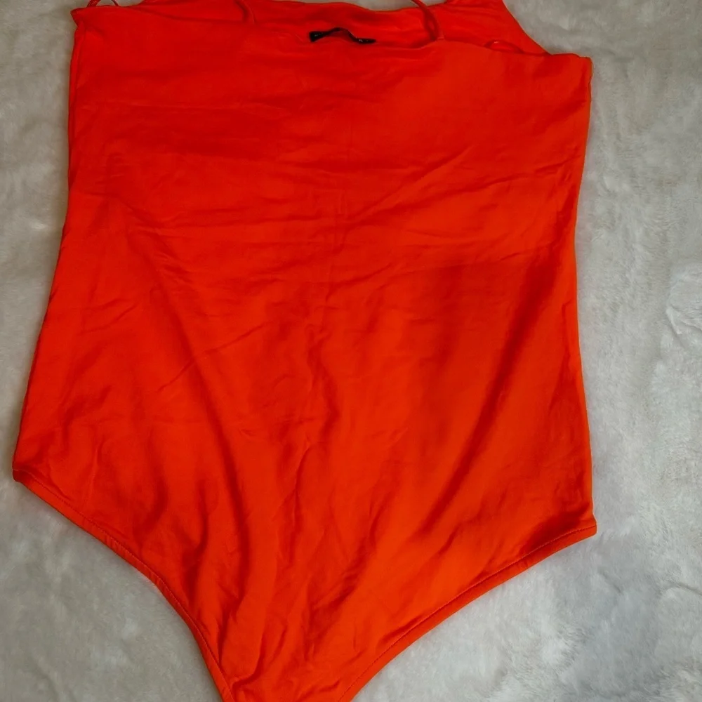 Vibrant Orange woman’s One Piece bodysuit - Picture 2 of 3